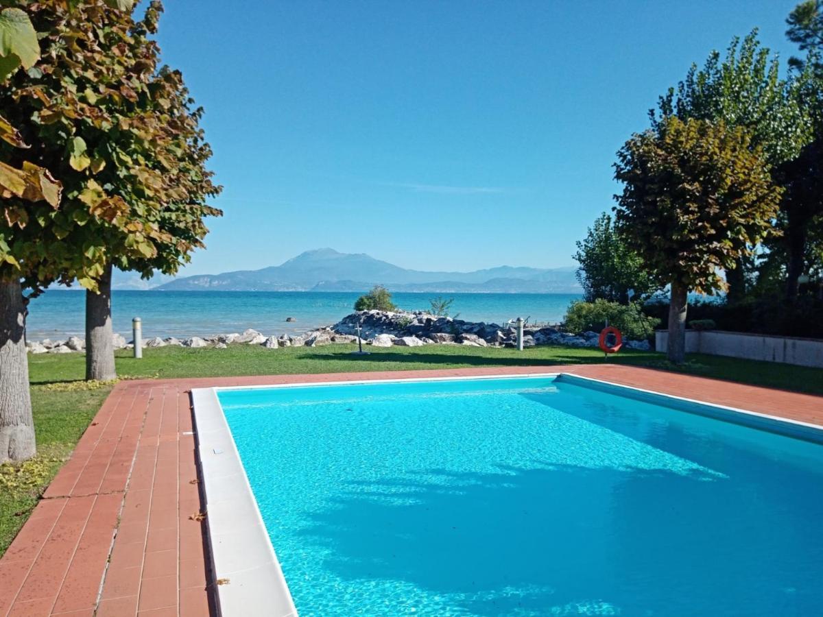 Casa Lugana 19 - Monolocale Con Piscina Direttamente A Lago Sirmione Exterior photo